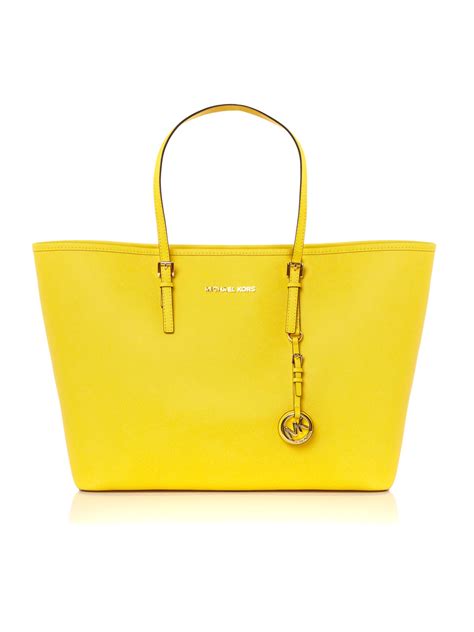 buy online michael kors neoprene jet set yellow tote bag|michael kors bag with airplanes.